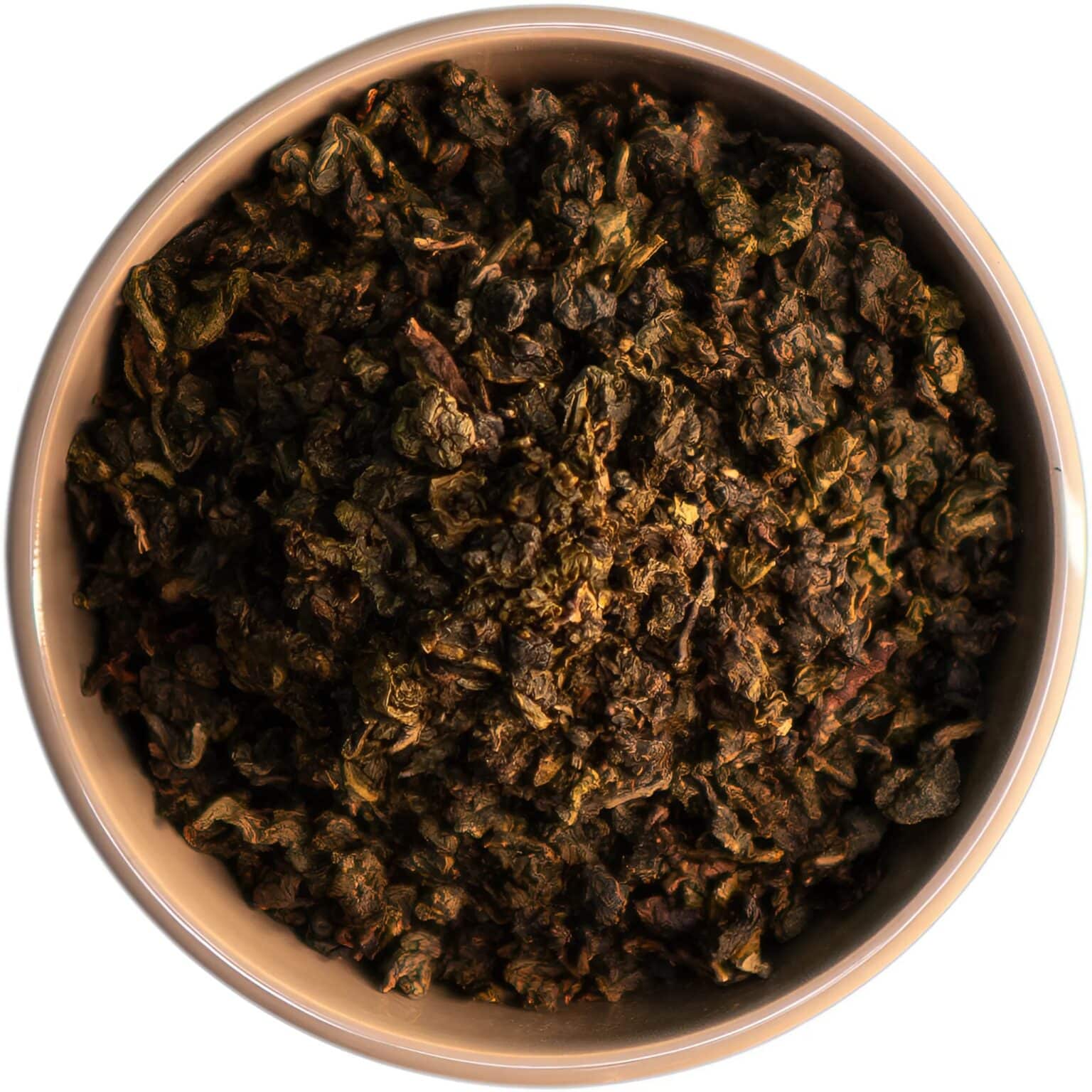 Milky Oolong – Ein Meisterwerk aus Fujian, handgefertigt mit einer einzigartigen, cremigen Note, die durch das Dämpfen der Teeblätter mit Milchwasserdampf entsteht. Olivgrüne Blätter und eine helle, aromatische Tasse