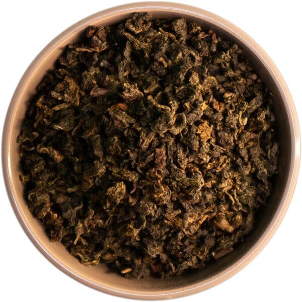 Bio China Tie Kuan Yin Oolong Tee – Ein Meisterwerk aus der Provinz Fujian mit smaragdfarbenen Teeblättern, lieblichen floralen Noten und einer süßlichen Nuance. Für höchsten Teegenuss in Bio-Qualität
