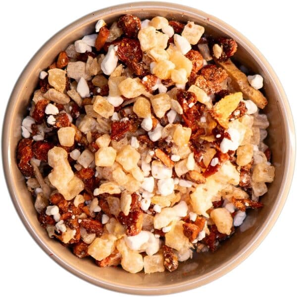 Säurearmer Früchtetee Freche Früchte, hergestellt aus natürlichen Zutaten wie Apfel, Ananas und Zitronengranulat, perfekt für Erfrischungen.